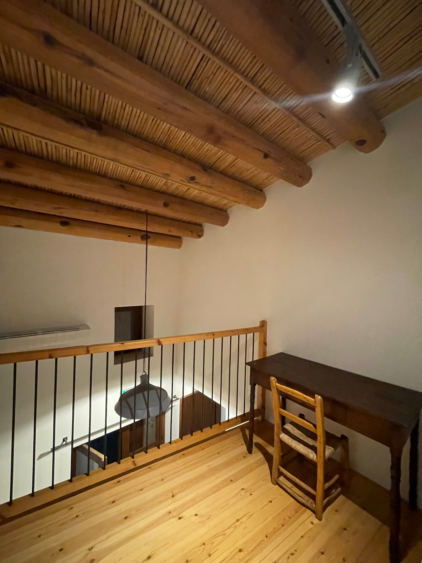The loft study corner overlooking the lower level