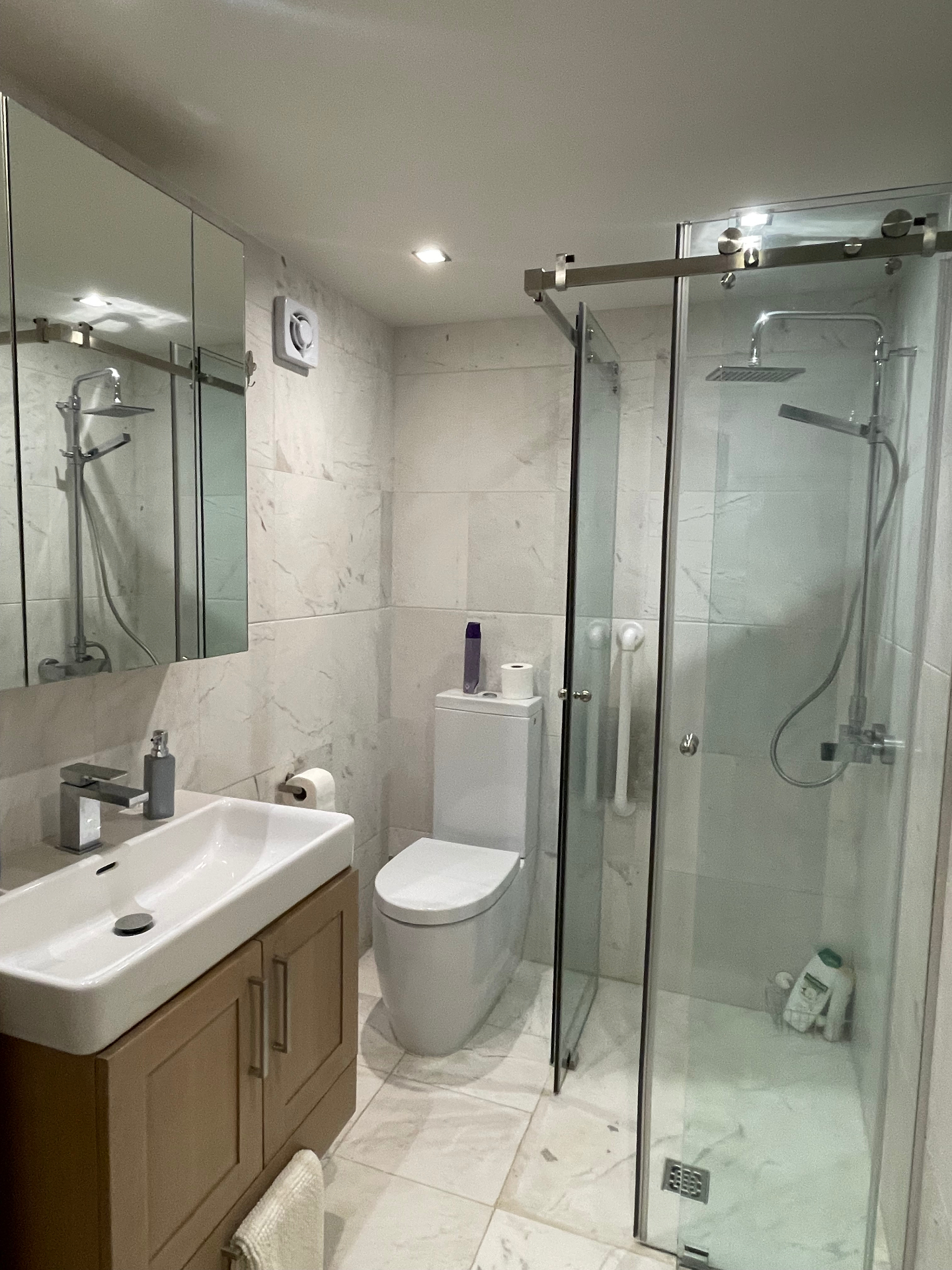 The modern marble en-suite bathroom